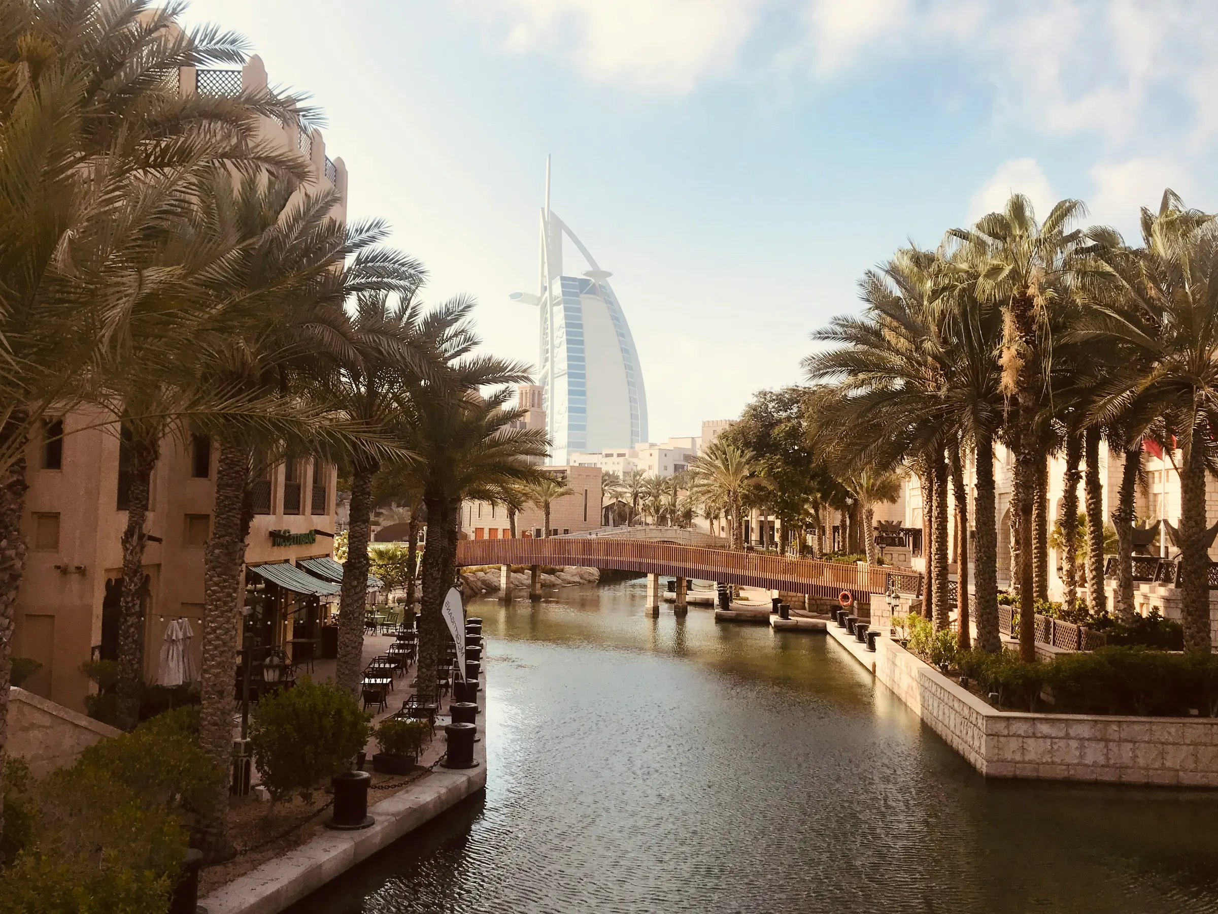 Waterways and palm trees in a traditional-style district of Dubai